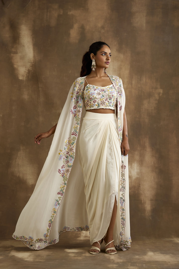 Ivory draped skirt with embroidered crop top & cape