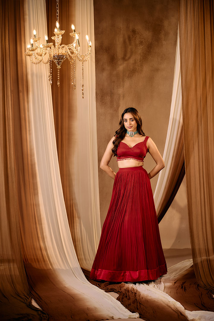 Ruby Red Pleated lehenga skirt with blouse and cape