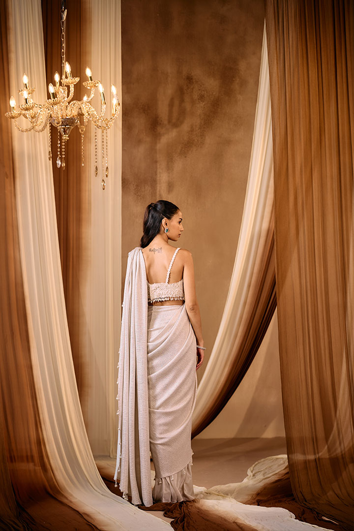 Elegant Ivory Gold Draped saree