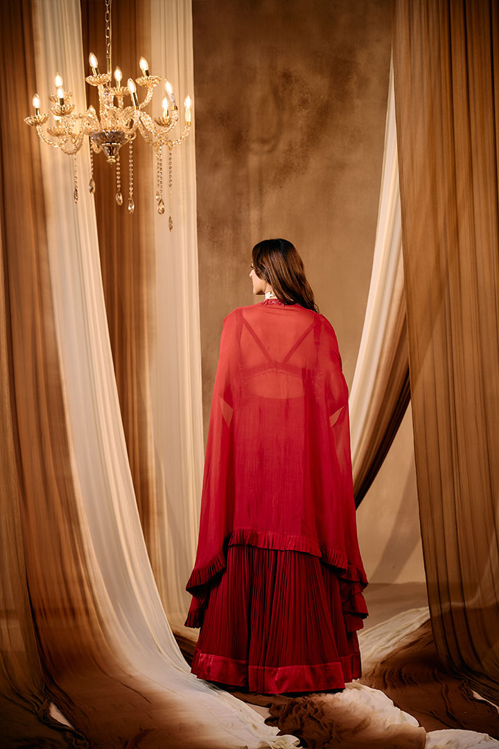 Ruby Red Pleated lehenga skirt with blouse and cape