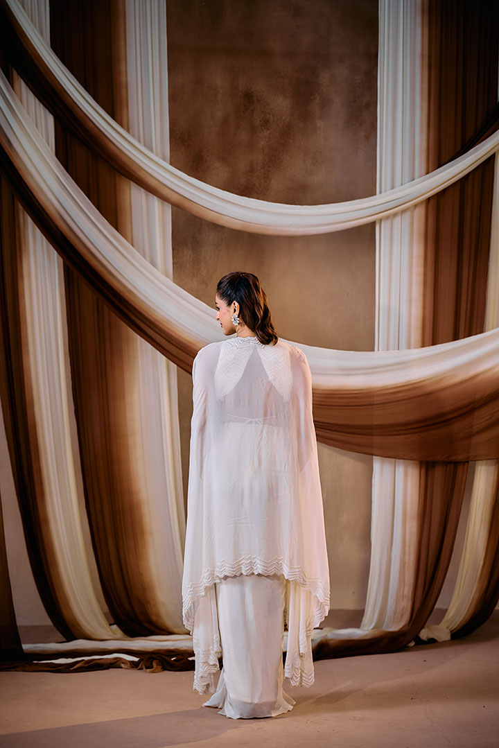 Ivory draped skirt with top and cape